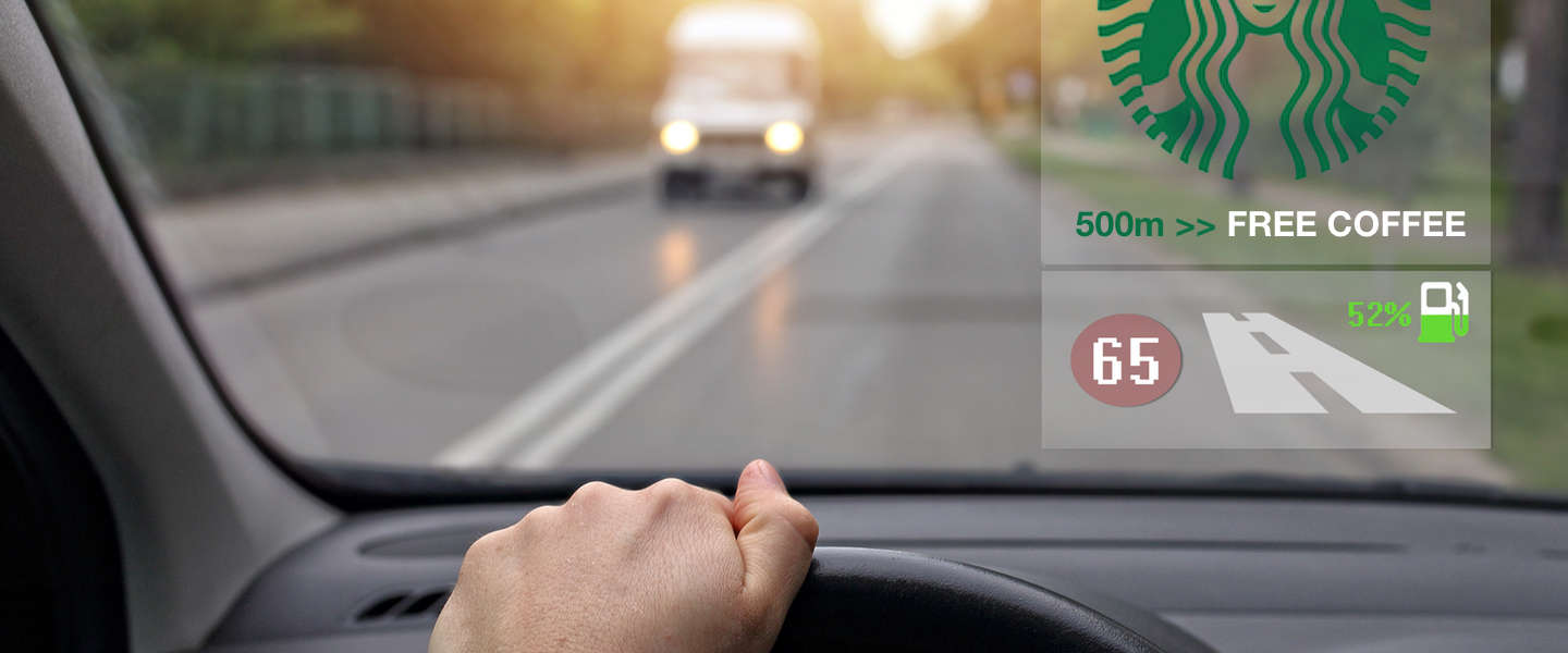 Advertenties op je voorruit tijdens het rijden: dichterbij dan je denkt