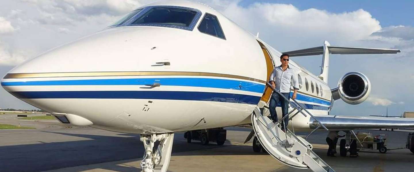 Sam Huang is de Airmiles-koning van de wereld