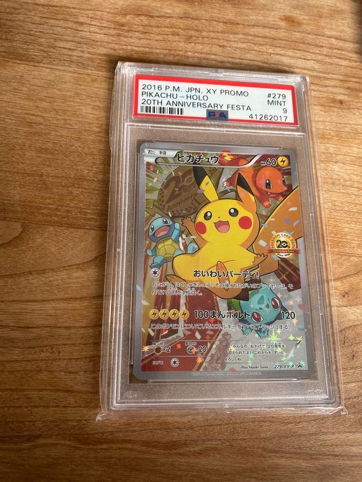 Pokémon 20 anniversary trading card.