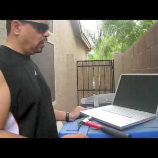 Ice T Repairs a Macbook 